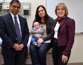 Janine Charles and her son Deegan with Dr. Abhay Lodha and Karen Benzies, PhD, RN,  who are launching a study to investigate if family integrated care in NICUs improves the health of premature babies through a joint Alberta Health Services and Alberta Innovates - Health Solutions grant.