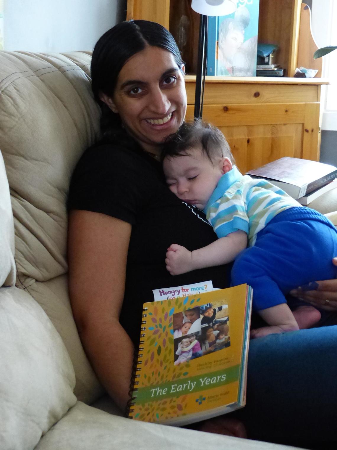 Inarah, a mother who participated in the study, pictured here with her son Issac used the Healthy Parents, Healthy Children book for information related to her son and her three-year-old daughter.