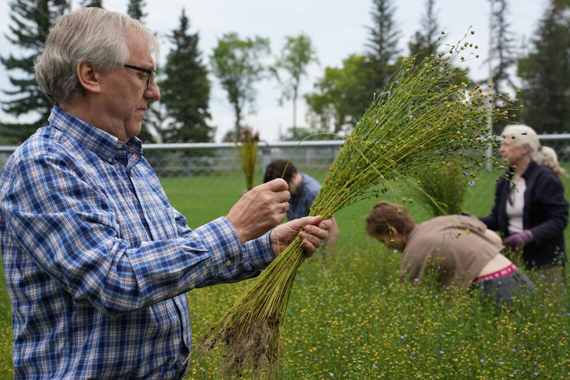 Man holding flax