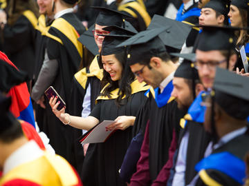 Students celebrate graduation at the 2019 fall convocation ceremony.