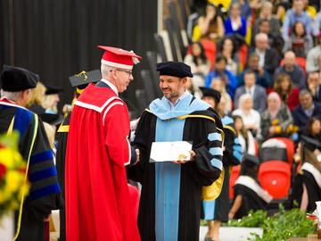 Students celebrate graduation at the 2019 fall convocation ceremony.