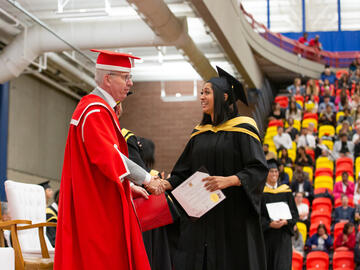 Students from the Faculty of Science celebrate graduation at the University of Calgary convocation ceremony on Thursday, June 1, 2023. President Ed McCauley does the honours.