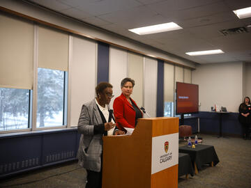 Dr. Malinda Smith and Dr. Amy Dambrowitz share opening remarks at the First-Generation Scholars Networking Night