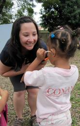 Kate Wong in Dominican Republic in 2011 with preschool students.