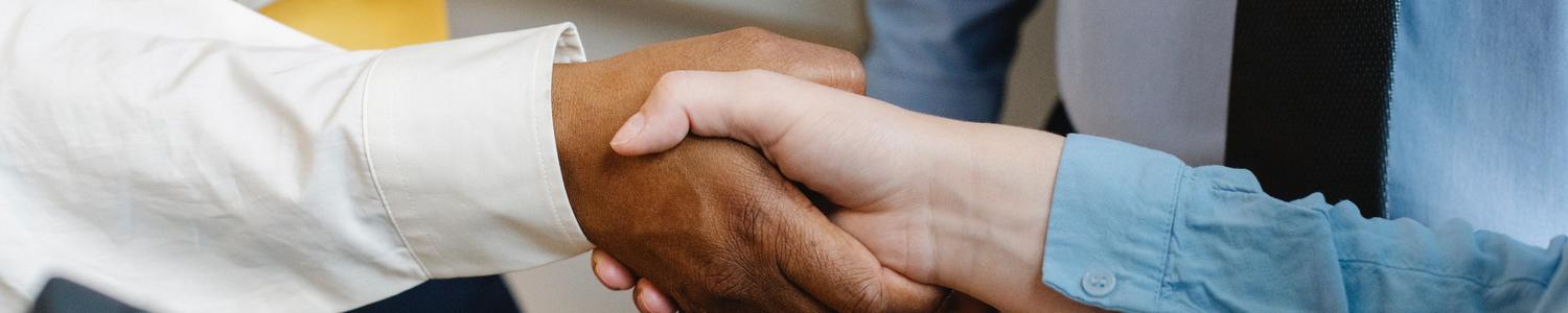 Two people shaking hands