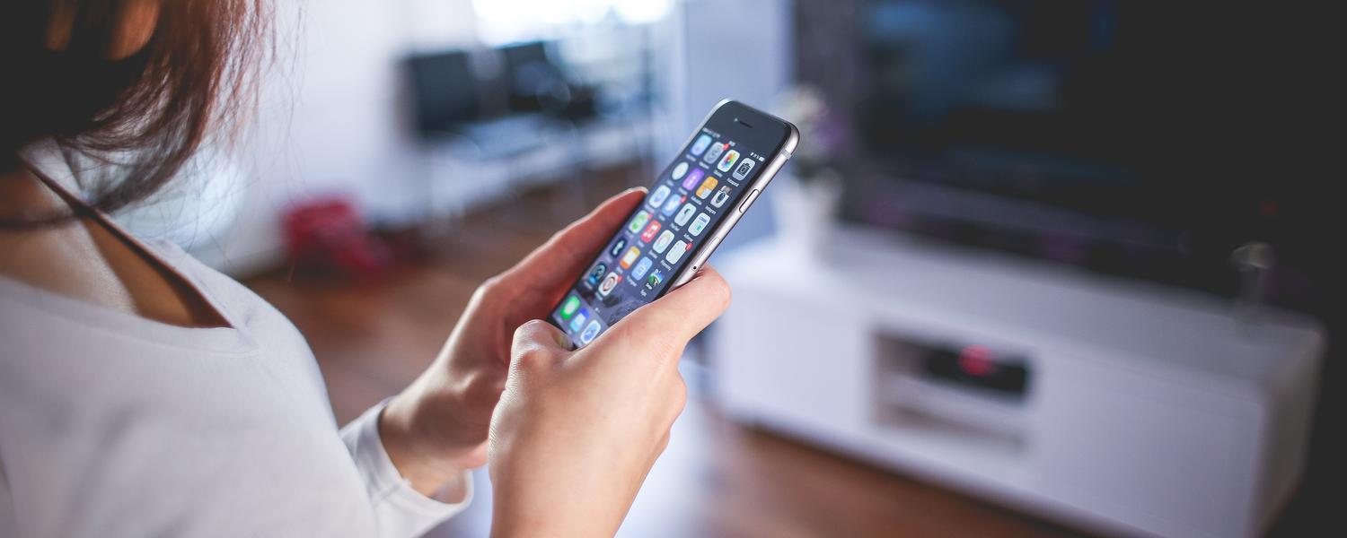 Woman holding smartphone