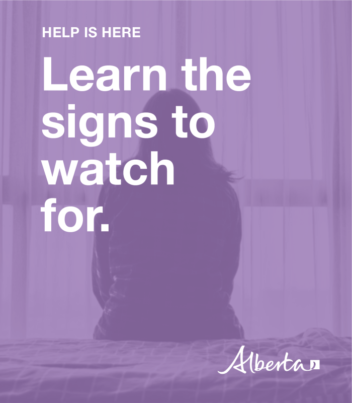 Lady sitting with her back turned towards the viewer, with a light purple overlay and text that reads "learn the signs to watch for"