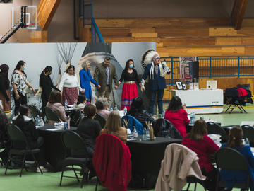 Cohort of students and presenters during recognition ceremony with Dr. Kent Ayoungman (far right)