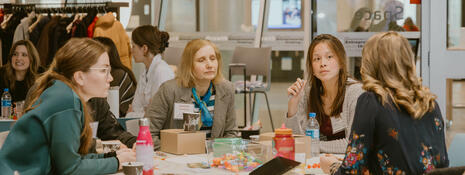 Group collaborating around meeting table